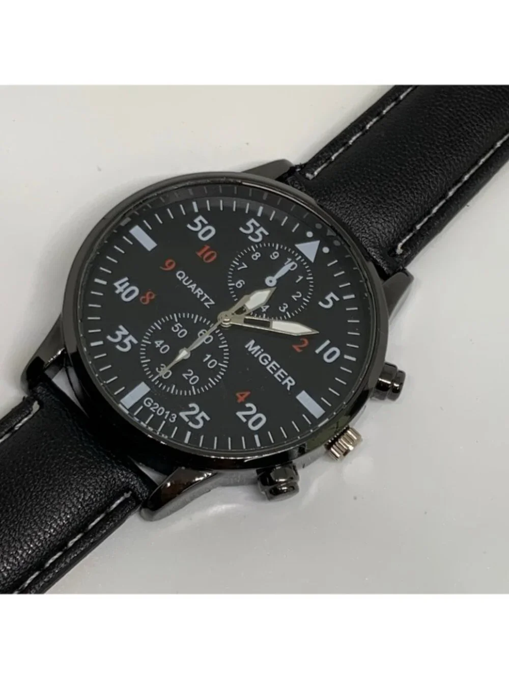 MiGEER men’s quartz analog watch 42mm silver tone black dial leather running